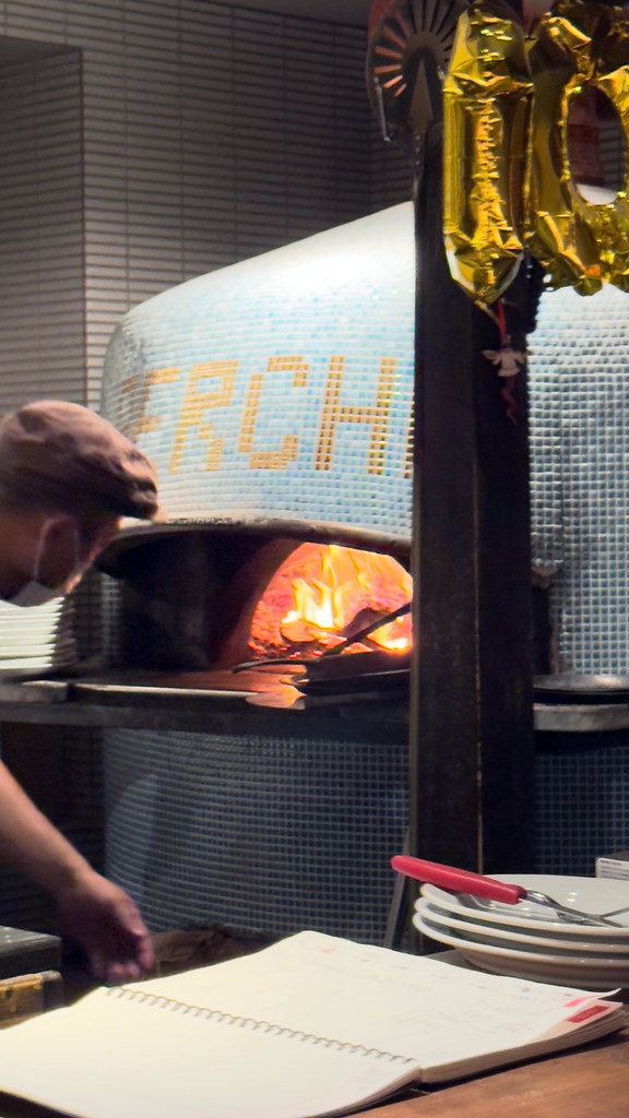 Professional wood-fired pizza oven serving fast fresh pizza